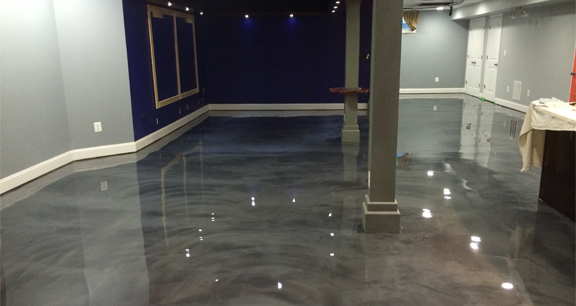 This image shows a Basement Floor with gray metallic epoxy paint.