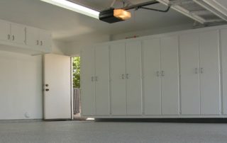 This image shows a garage floor with epoxy painted floor.